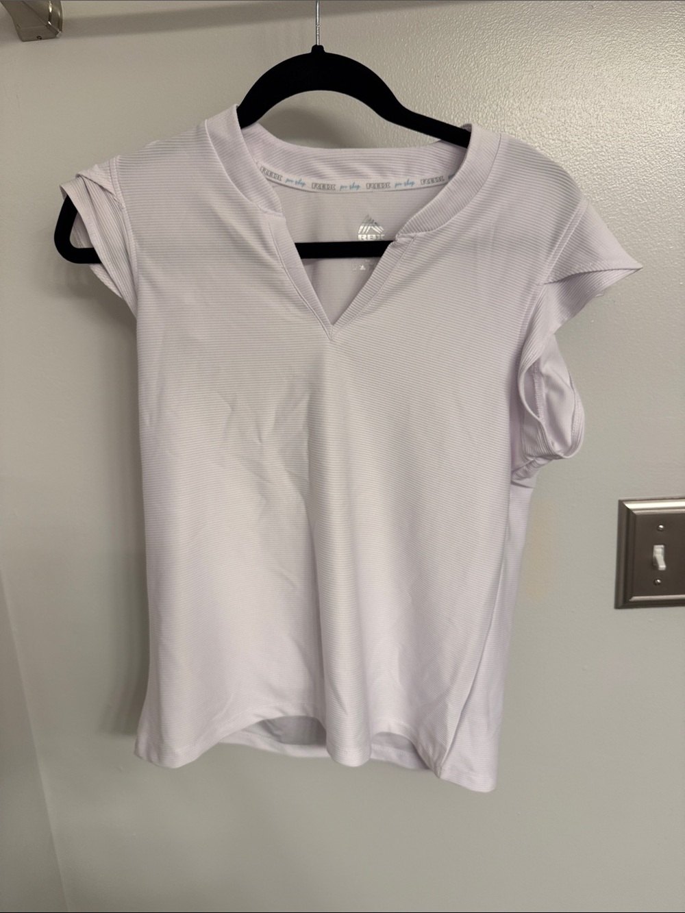 Women’s white V-Neck Active Golf Tee